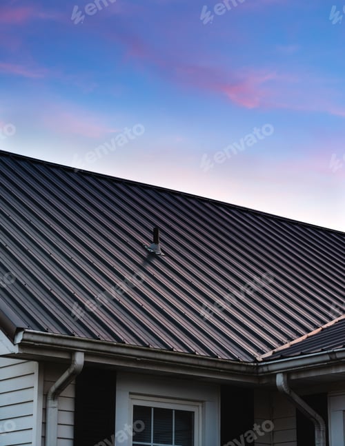 Preview: a beautiful house metal roof during the sunset