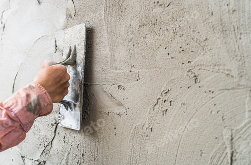 Preview: Plasterer Applying Cement with Finishing Float