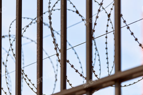 Preview: Barbed wire on prison fence