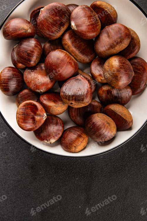 Preview: Edible chestnuts delicious treat tasty snack fresh gourmet food background on table