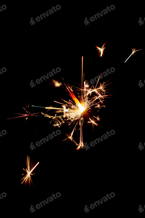 Preview: One bengal fire sparkles against the black background.