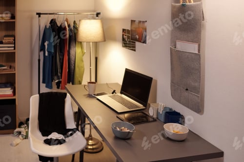 Preview: Workplace of contemporary sportsman by wall of domestic room