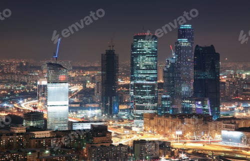 Preview: View from the rooftops in the winter on skyscrapers night city