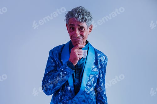 Preview: Senior man posing in studio.