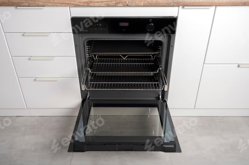 Preview: New modern electric oven built in black with screen, convention and grill, empty and open