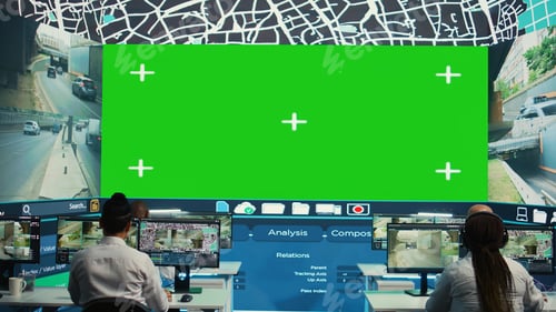 Preview: Group of employees monitoring delivery trucks routes with an isolated screen