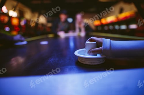 Preview: Young people playing air hockey