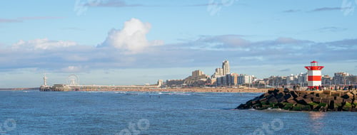 Preview: Panoramic view over Scheveningen Pier, beach, and harbor entrance with light house