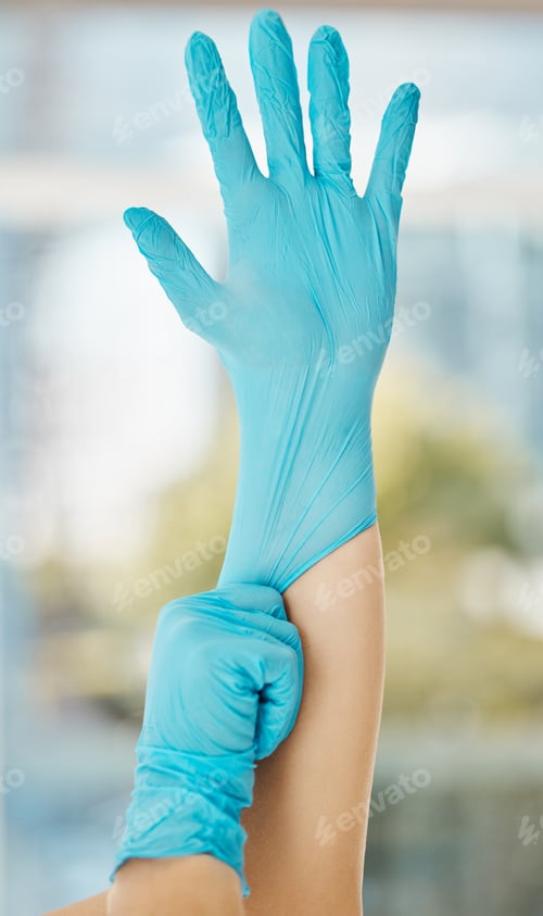 Preview: Arm Preparing to Put on a Blue Glove