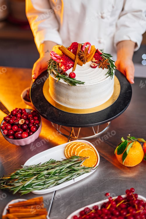 Preview: Delicious cake adorned with fresh fruit and spices creating a festive atmosphere
