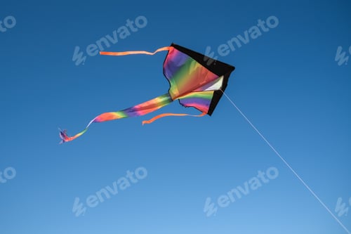 Preview: Colorful kite in blue sky