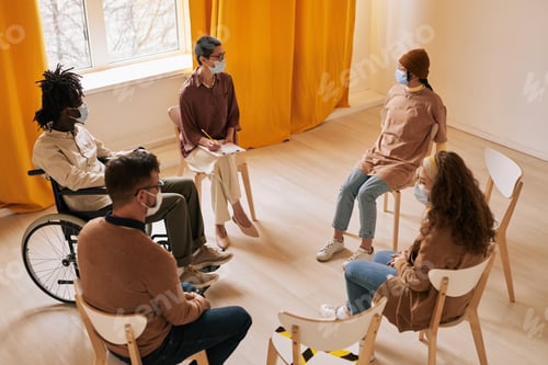 Adults in Group Therapy Wearing Protective Face Masks