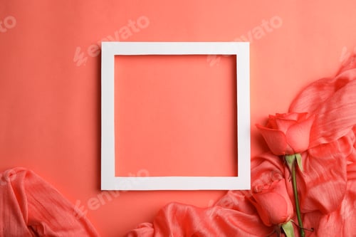 Preview: Flat lay composition with frame, roses and fabric on coral background. Space for text