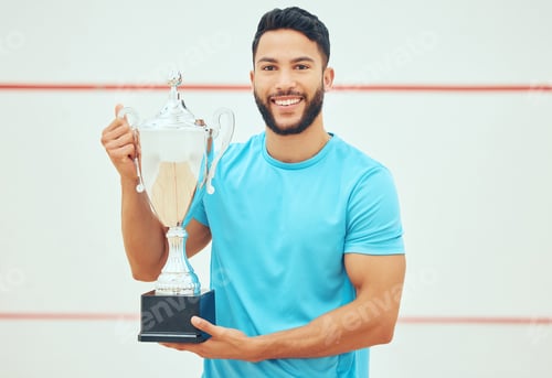 Preview: Portrait of squash player smiling and holding trophy after playing and winning court game with copy