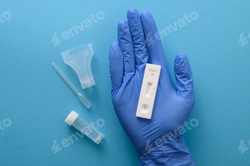 Preview: Hand showing antigen covid test