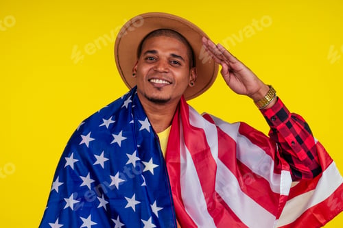 Preview: american man wrapped on flag looking at ca,era and snow-white smile