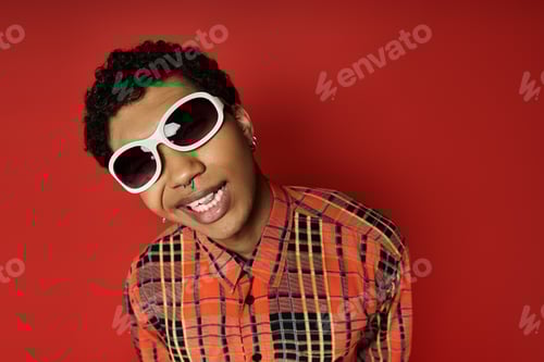 Preview: Stylish Young Man in Plaid