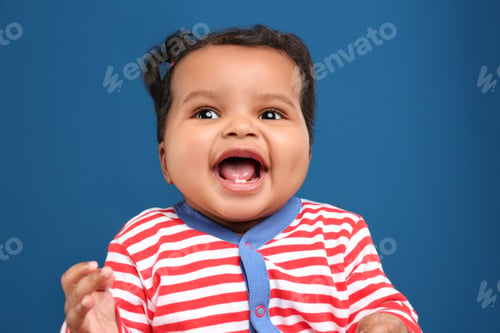 Preview: Cute African American baby on blue background