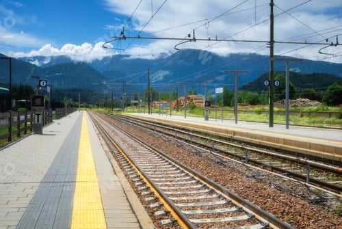 Preview: Railway station in alpine mountains on summer sunny day