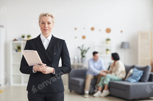 Preview: Businesswoman working at home