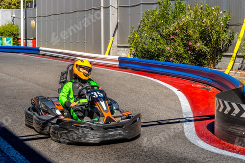 Preview: Person driving go kart on a racing track