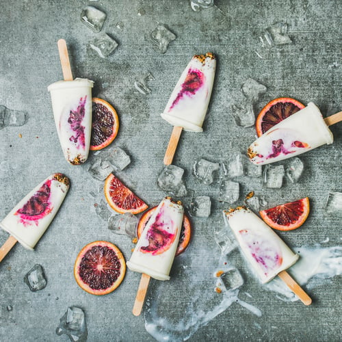 Preview: Blood orange, yogurt, granola popsicles on ice cubes, square crop