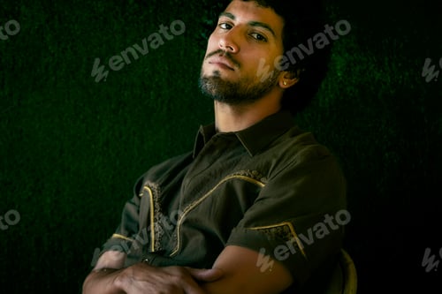 Preview: Studio portrait of mid adult man