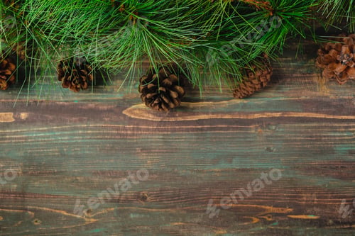 Preview: Christmas pine tree fir with pine cone decoration on vintage rustic wood table background