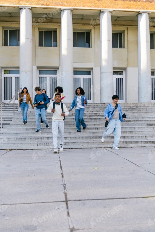 Preview: Diverse student group walking university campus stairs