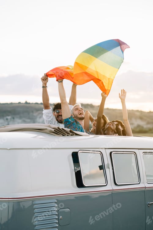 Preview: People with LGBT flag in van