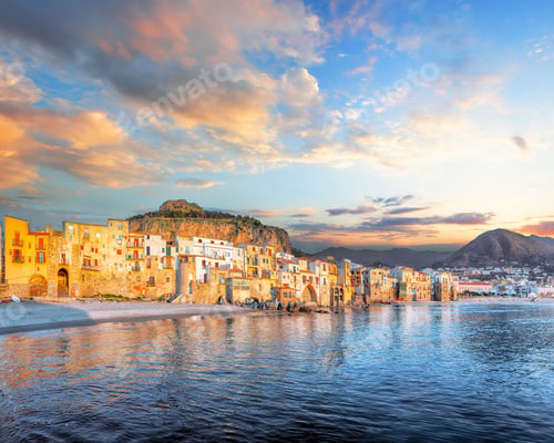 Preview: Picturesque evening cityscape of Cefalu city. Popular travel destination of Mediterranean sea.