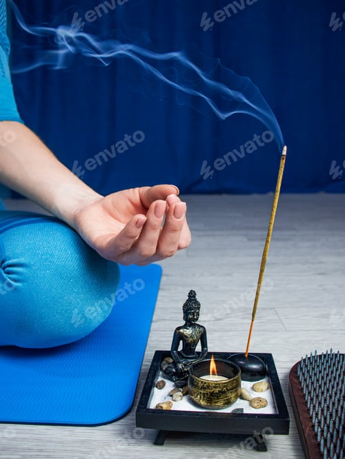 Preview: smoke from incense stick, candle and Buddha figurine, incense set with a Buddha figure, Cyan mudra