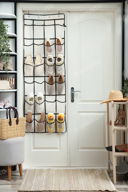 Preview: Organizer with different footwear and accessories indoors. Shoe storage