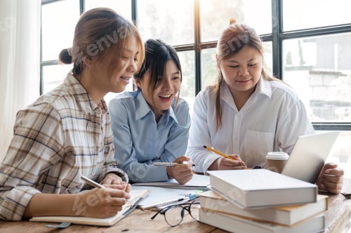 Preview: Distracted from preparing college project happy young laughing diverse classmates having fun