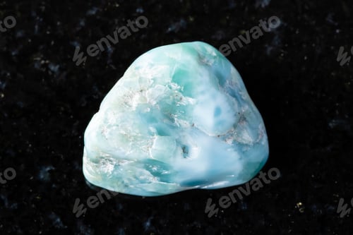 Preview: sample of raw larimar mineral on black granite