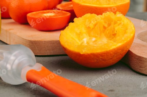 Preview: Orange juicer apparatus on kitchen table close up