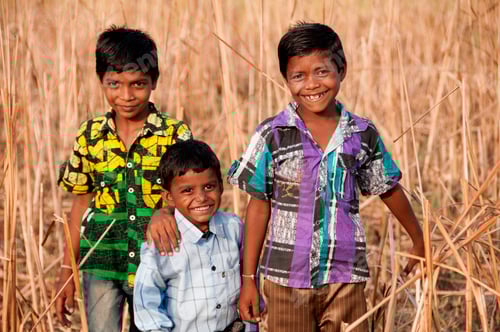 Preview: Rural boy enjoying together in the field, India.