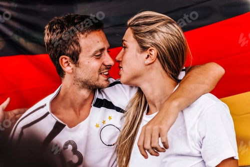 Preview: Supporters from Germany kissing at Stadium
