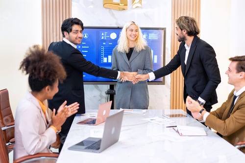 Preview: Team business meeting in room brainstorm together and Shaking hands for success operation winner