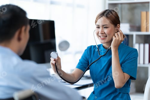 Preview: Doctor and patient sitting and talking at medical examination at hospital office