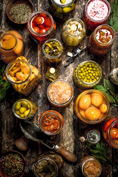 Preview: Various preserved vegetables and mushrooms with seamer and spices.