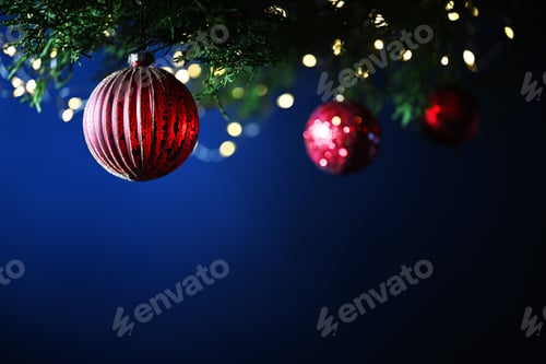 Preview: Christmas tree branch with red baubles