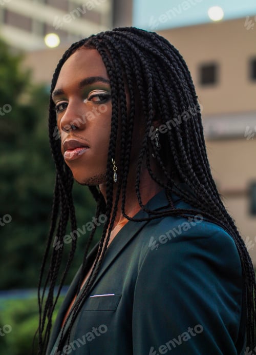 Preview: Trans woman wearing makeup and green blazer