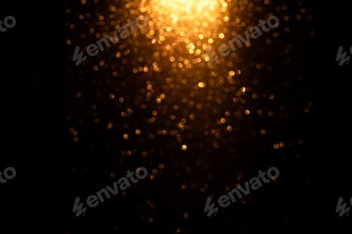 Preview: Glowing golden oval bokeh with shimmering light on dark background