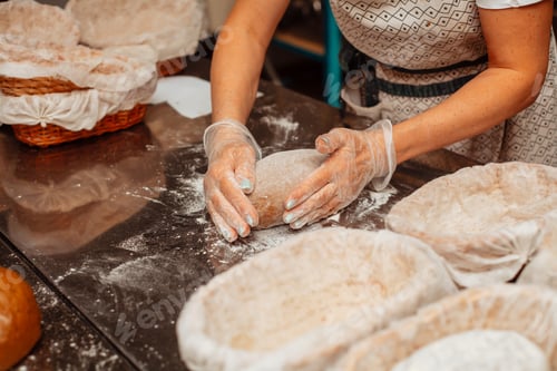 Preview: baker shaping dough for bread