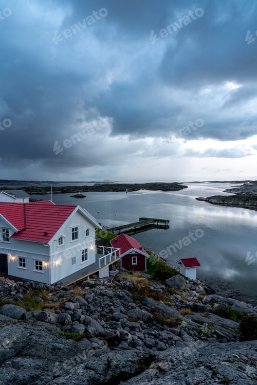 Preview: Rocky shore with houses on a bay in Sweden