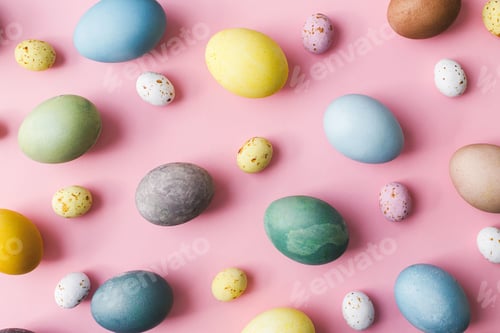 Preview: Stylish eggs flat lay on pink background. Modern natural dyed colorful easter eggs and candy