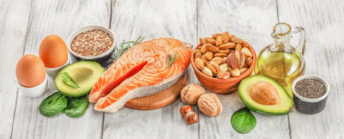 Preview: Food sources of omega 3 and healthy fats on a wooden background. top view