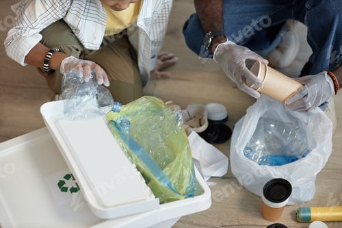 Preview: Top View Father and Son Sorting Plastic