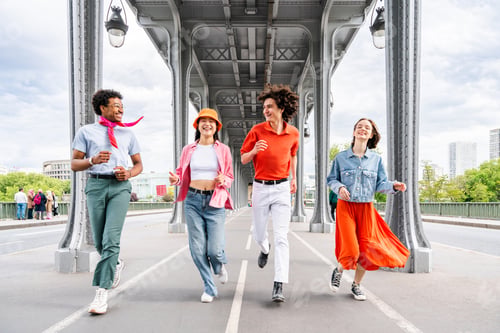 Preview: Group of young happy friends visiting Paris and Eiffel Tower